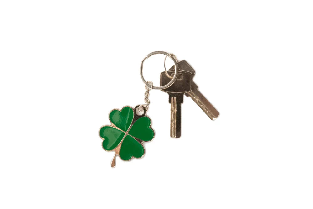 A keychain with a four-leaf clover.