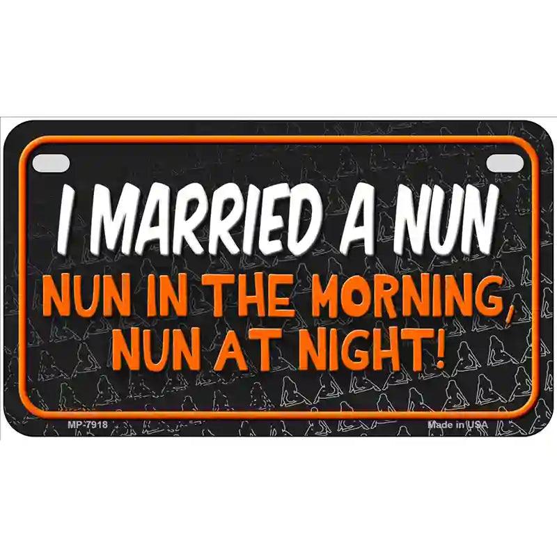 I Married A Nun Silhouettes Novelty Metal License Plate 7" x 4" (MP)