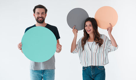 Couple holding up blank signs for customization