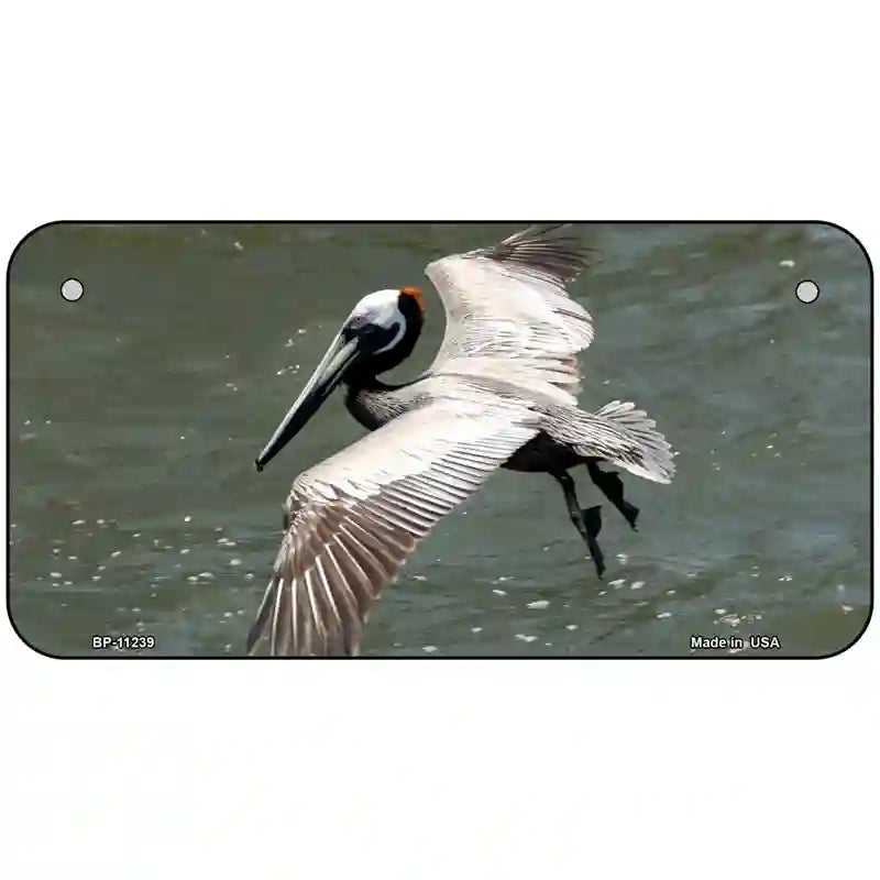 Pelican In Flight Novelty Metal License Plate 6" x 3" (BP)