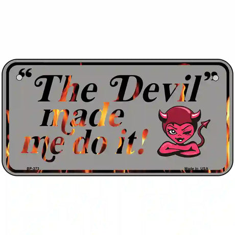 The Devil Made Me Metal Novelty License Plate 6" x 3" (BP)