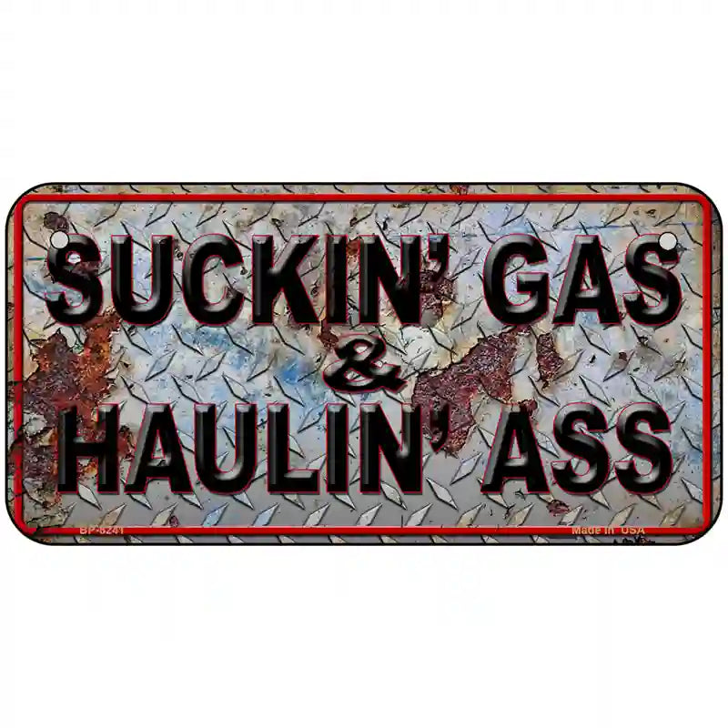 Suckin Gas Haulin Ass Vintage Novelty Metal License Plate 6" x 3" (BP)