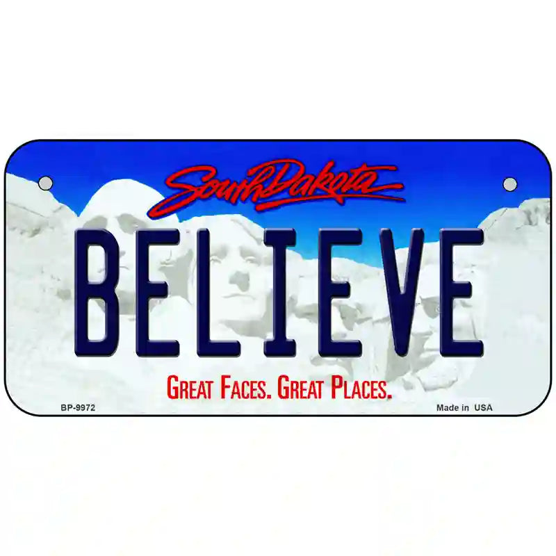 Believe South Dakota Metal Novelty License Plate 6" x 3" (BP)