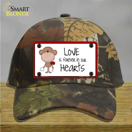 Love In Our Hearts Novelty License Plate Hat Cotton / Camoflauge