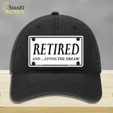 Retired And Living The Dream Novelty License Plate Hat Unconstructed Cotton / Black