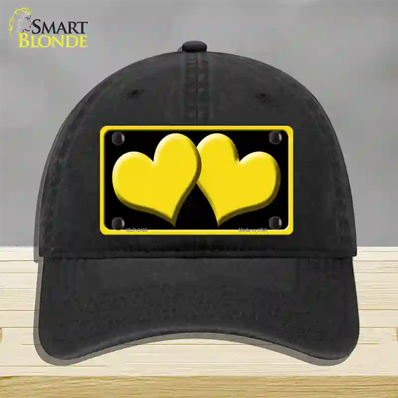 Solid Yellow Centered Hearts Black Novelty License Plate Hat Unconstructed Cotton / Black