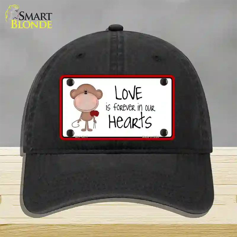 Love In Our Hearts Novelty License Plate Hat Unconstructed Cotton / Black