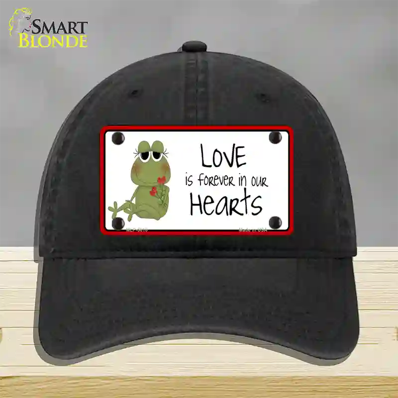 Love In Our Hearts Frog Novelty License Plate Hat Unconstructed Cotton / Black