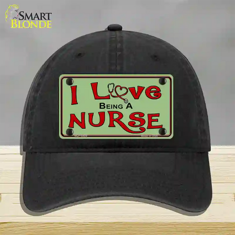 I Love Being A Nurse Novelty License Plate Hat Unconstructed Cotton / Black