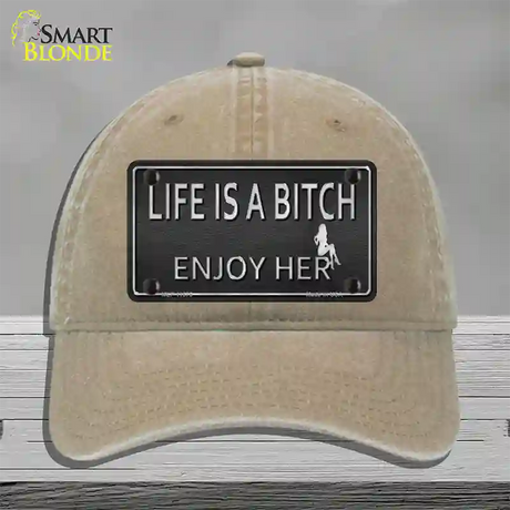 Life Is A Bitch Enjoy Her Novelty License Plate Hat Unconstructed Cotton / Khaki