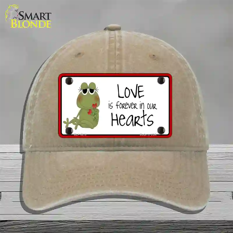 Love In Our Hearts Frog Novelty License Plate Hat Unconstructed Cotton / Khaki