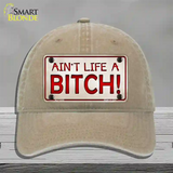 Aint Life A Bitch Novelty License Plate Hat Unconstructed Cotton / Khaki