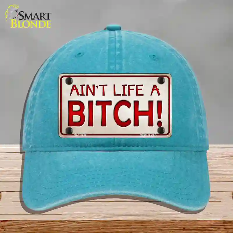 Aint Life A Bitch Novelty License Plate Hat Unconstructed Cotton / Lake Blue