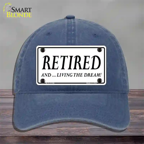 Retired And Living The Dream Novelty License Plate Hat Unconstructed Cotton / Navy