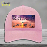 Retired and Loving It Novelty License Plate Hat Unconstructed Cotton / Pink