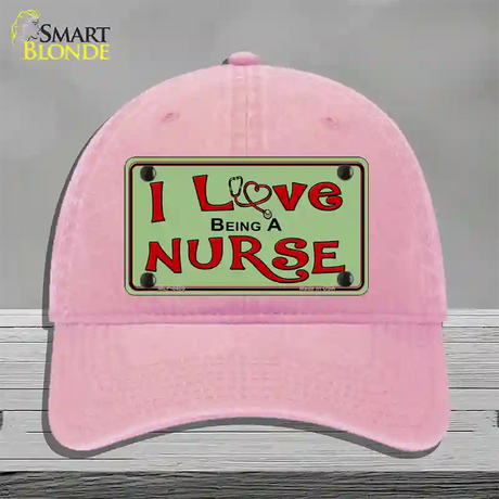 I Love Being A Nurse Novelty License Plate Hat Unconstructed Cotton / Pink