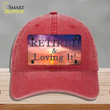 Retired and Loving It Novelty License Plate Hat Unconstructed Cotton / Red