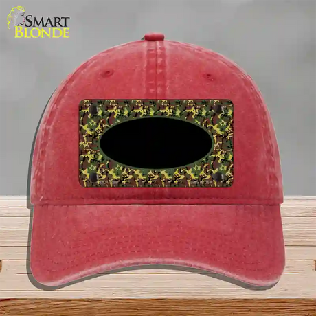 Green Camo Oval With Black Oval Center Novelty License Plate Hat Unconstructed Cotton / Red