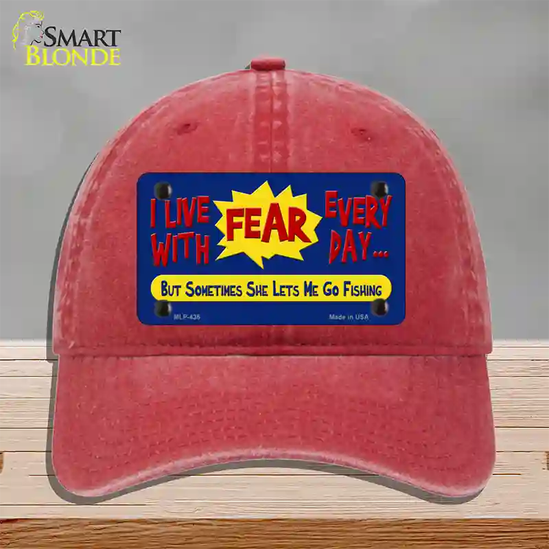 I Live With Fear Novelty License Plate Hat Unconstructed Cotton / Red