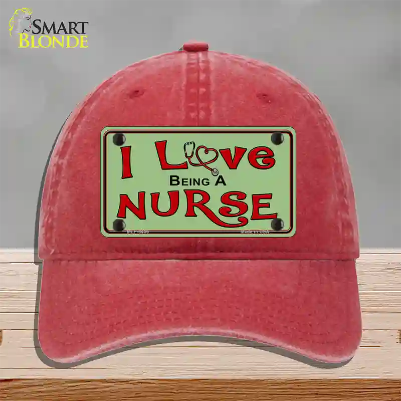 I Love Being A Nurse Novelty License Plate Hat Unconstructed Cotton / Red