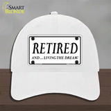 Retired And Living The Dream Novelty License Plate Hat Unconstructed Cotton / White