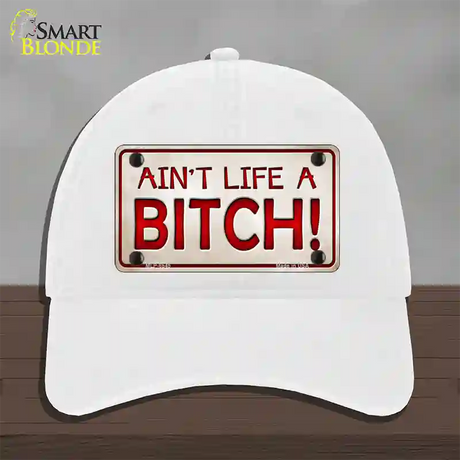 Aint Life A Bitch Novelty License Plate Hat Unconstructed Cotton / White