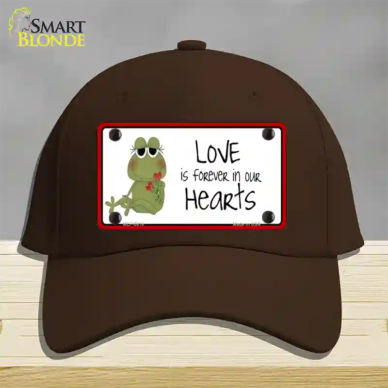 Love In Our Hearts Frog Novelty License Plate Hat Cotton / Dark Brown