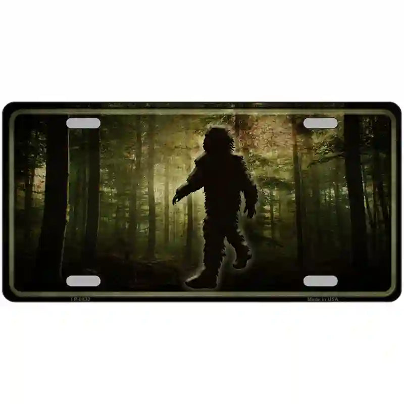 Bigfoot In The Woods Metal Novelty License Plate 12" x 6" (LP)