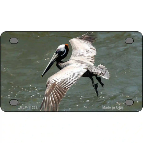 Pelican In Flight Novelty Metal License Plate 4" x 2.2" (MLP)