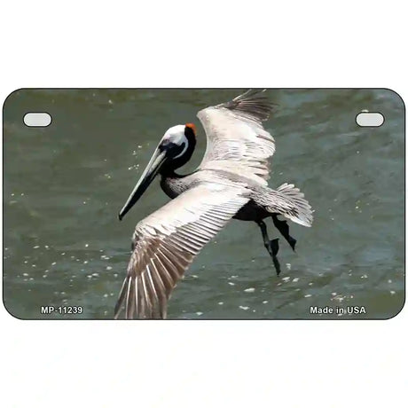 Pelican In Flight Novelty Metal License Plate 7" x 4" (MP)