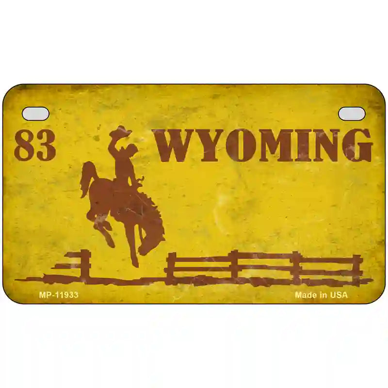 Wyoming Yellow Rusty Novelty Metal License Plate 7" x 4" (MP)