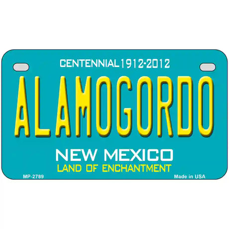 Alamogordo New Mexico Teal Novelty Metal License Plate 7" x 4" (MP)