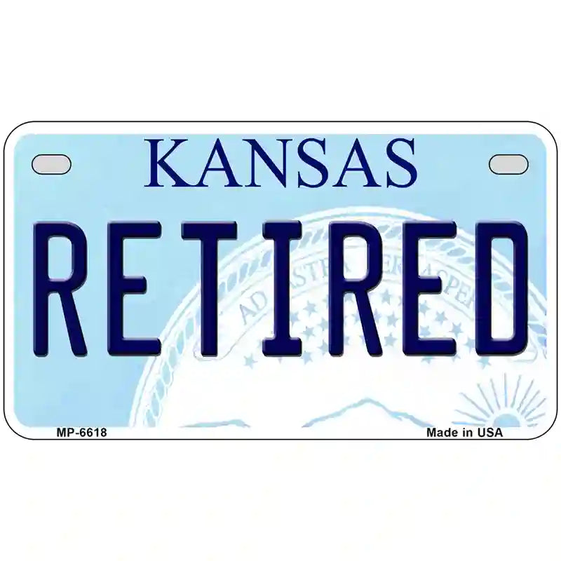 Retired Kansas Novelty Metal License Plate 7" x 4" (MP)